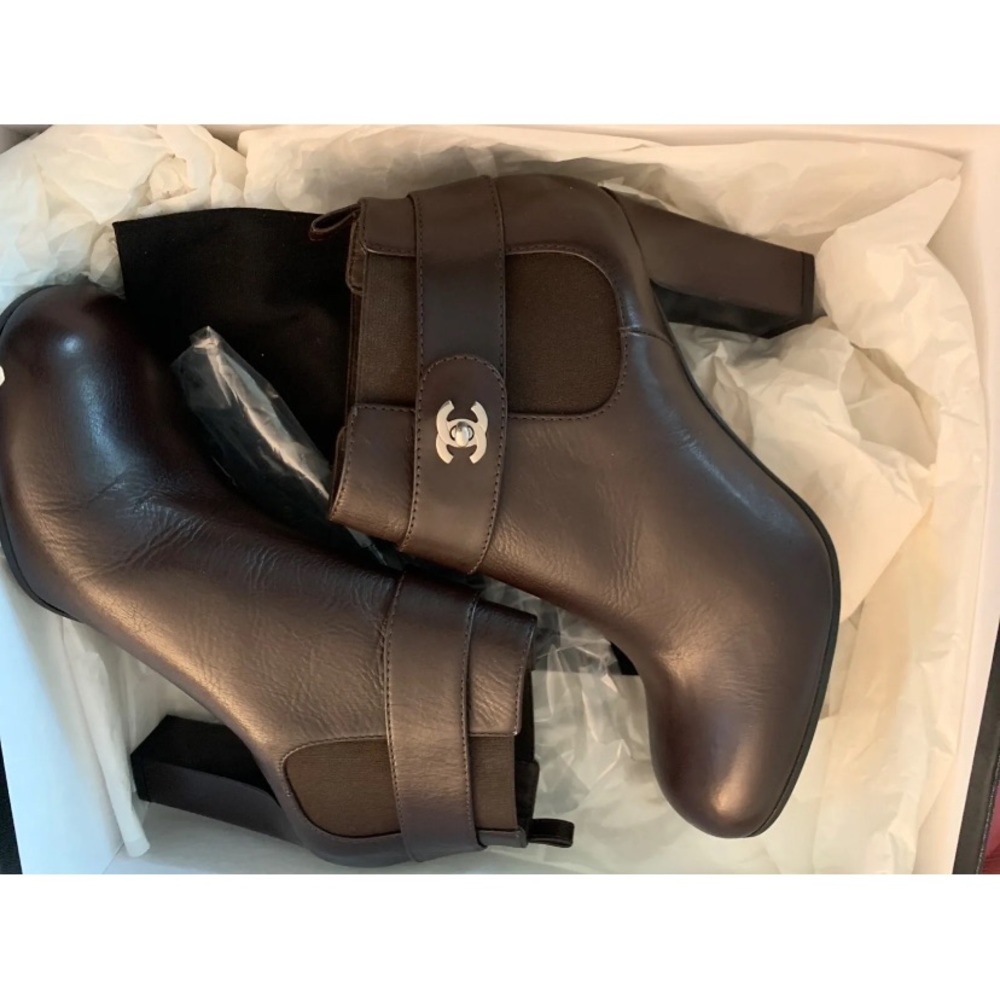 Chanel turn lock boots in dark brown